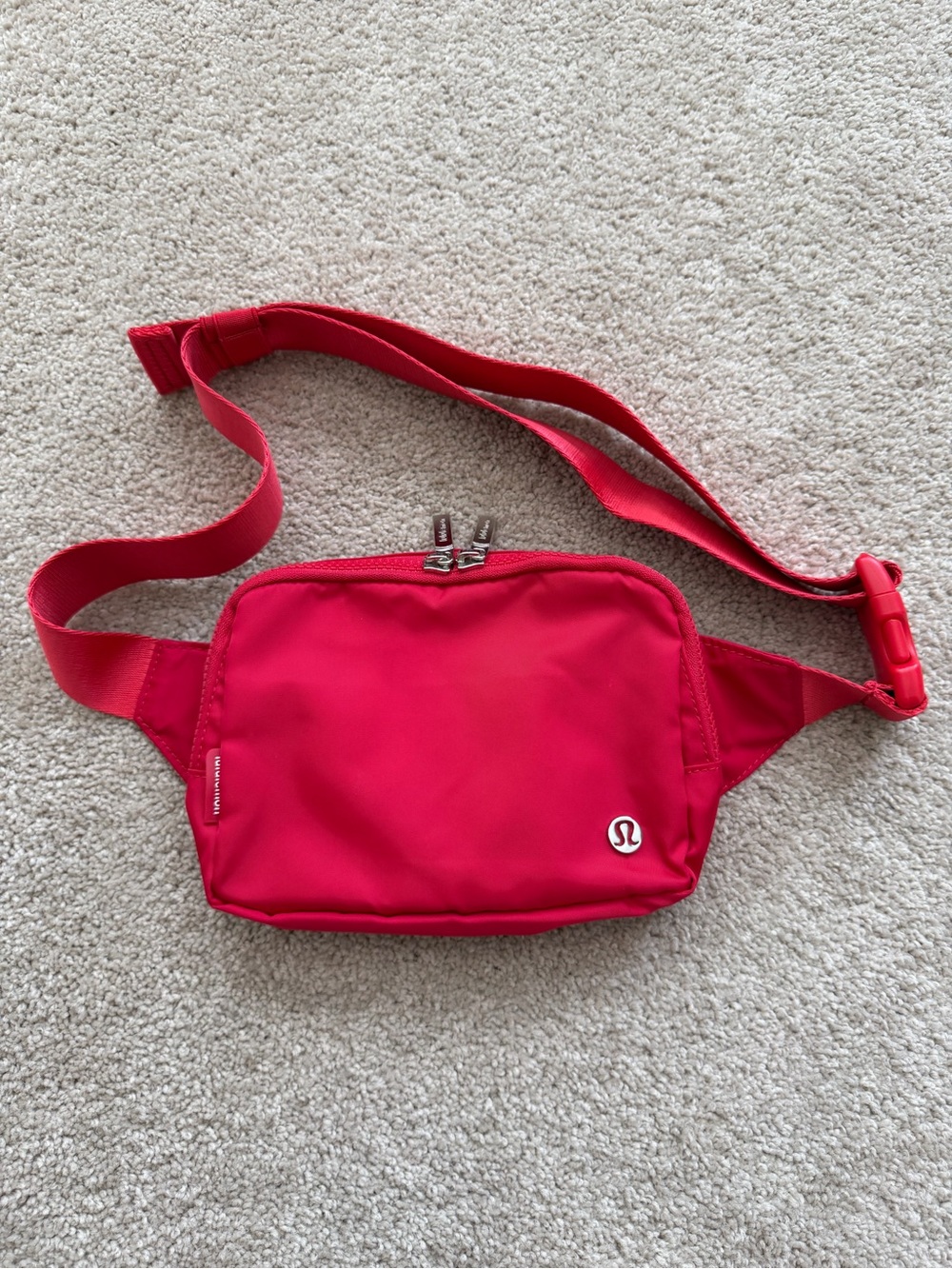 Lululemon Red Everywhere Belt Bag signature silver-toned zipper pulls